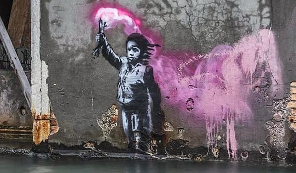 “The Migrant Child” by Banksy detached from canal wall of Palazzo San Pantalon as part of the artwork’s restoration process